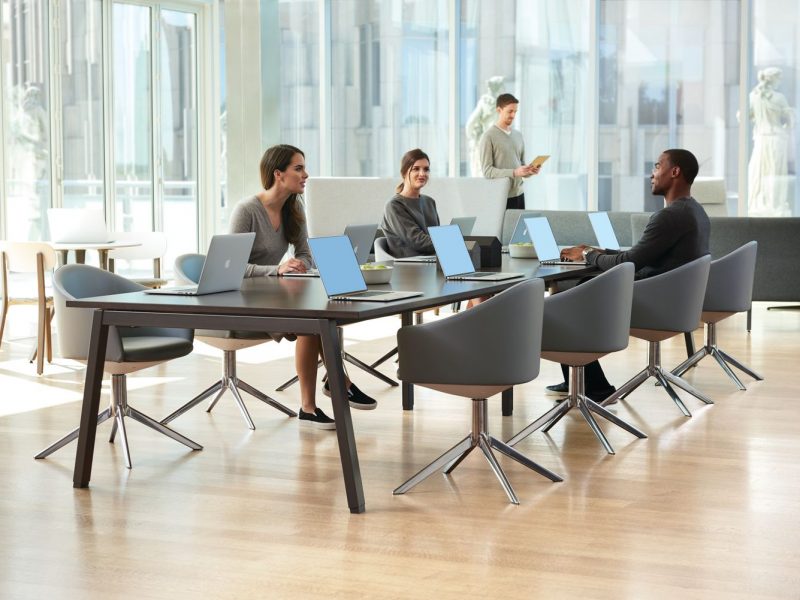 Low-Interpret-Table-with-Zones-Club-Chairs-in-Use